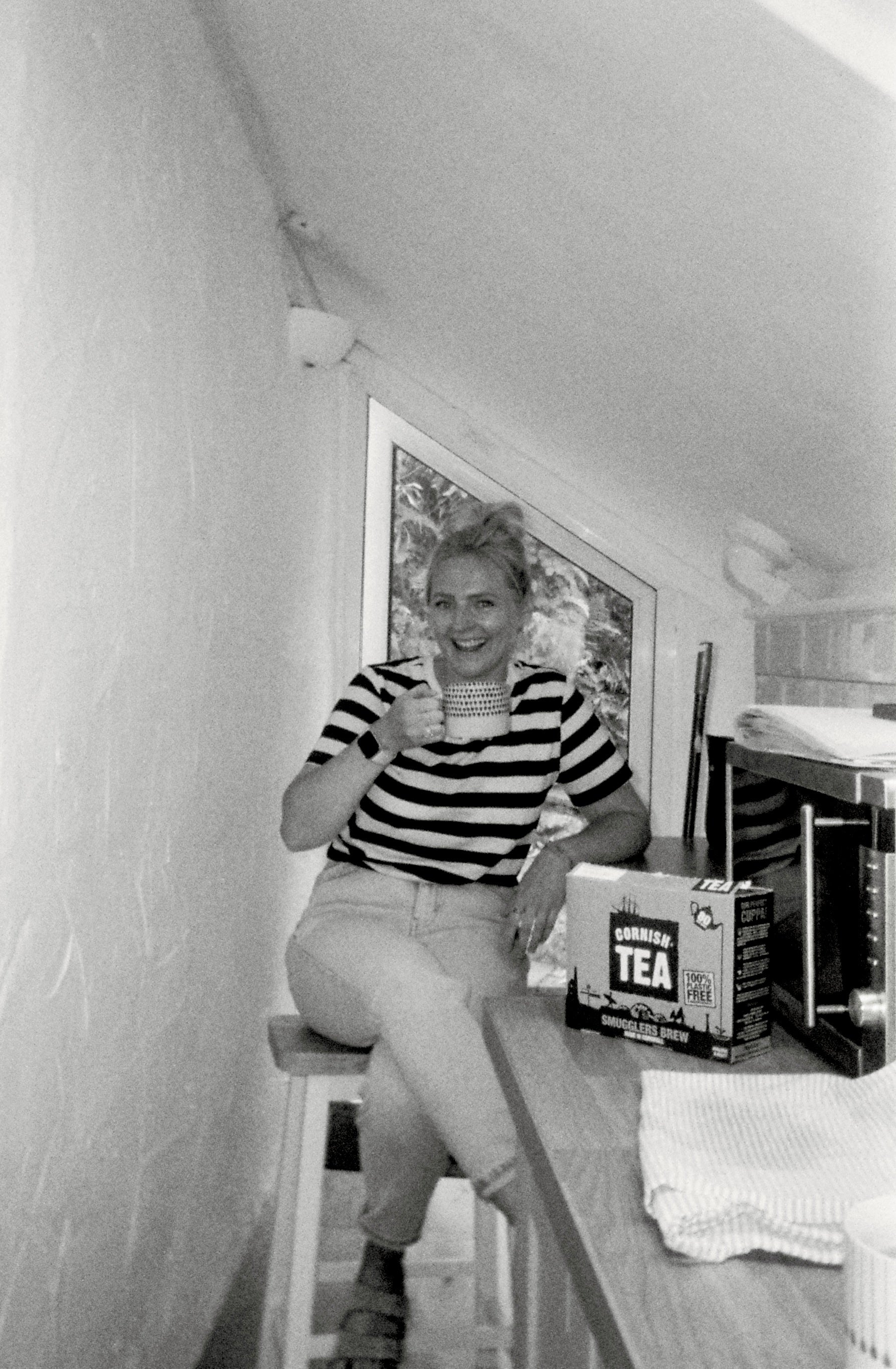 A black and white photograph of photographer Chelsey Leigh who is the creator of the framed photographs available from Fox & Fell